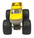Rear view of yellow Fullboar monster truck